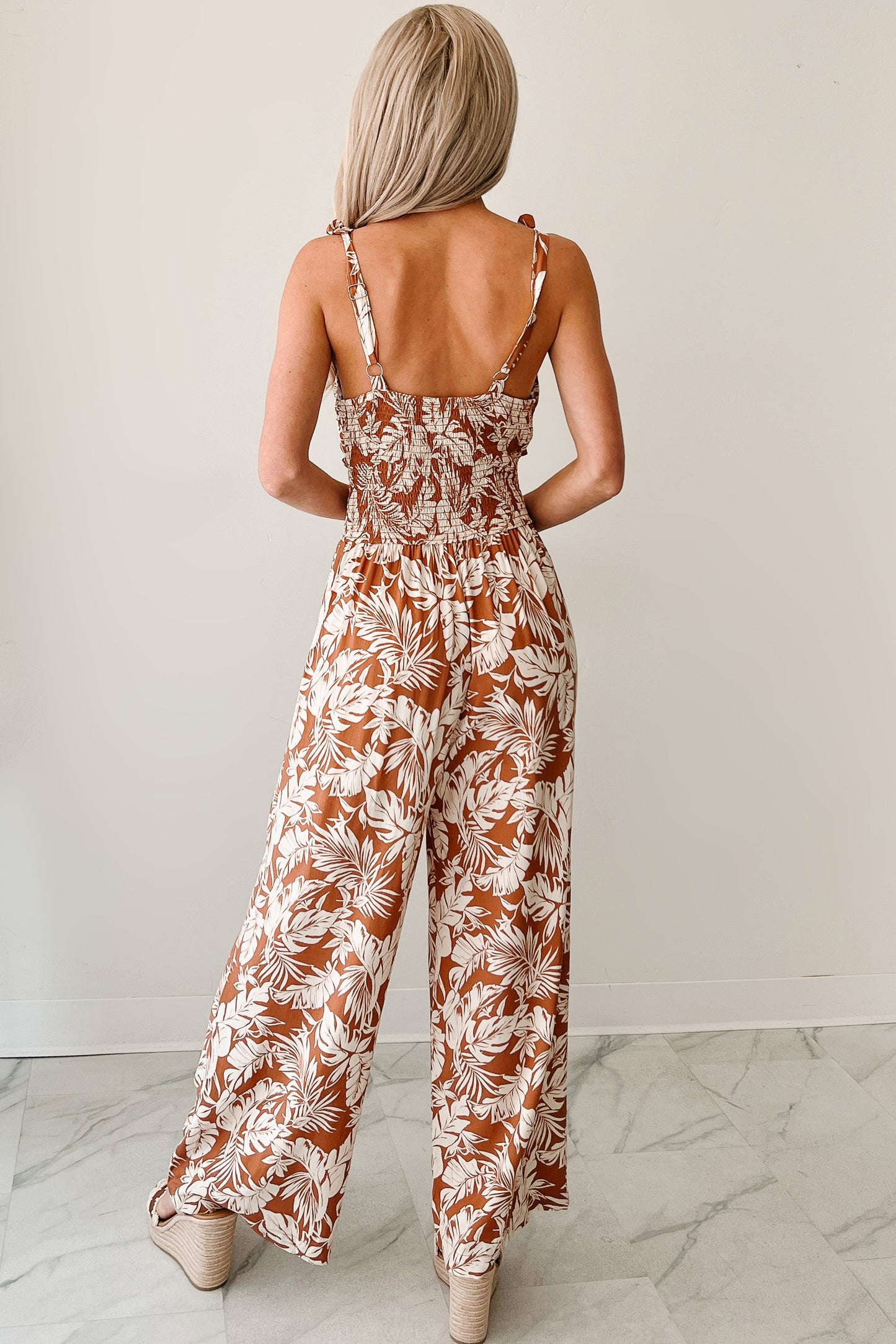 Flirt With Life Smocked Tropical Jumpsuit (Rust/Ivory)