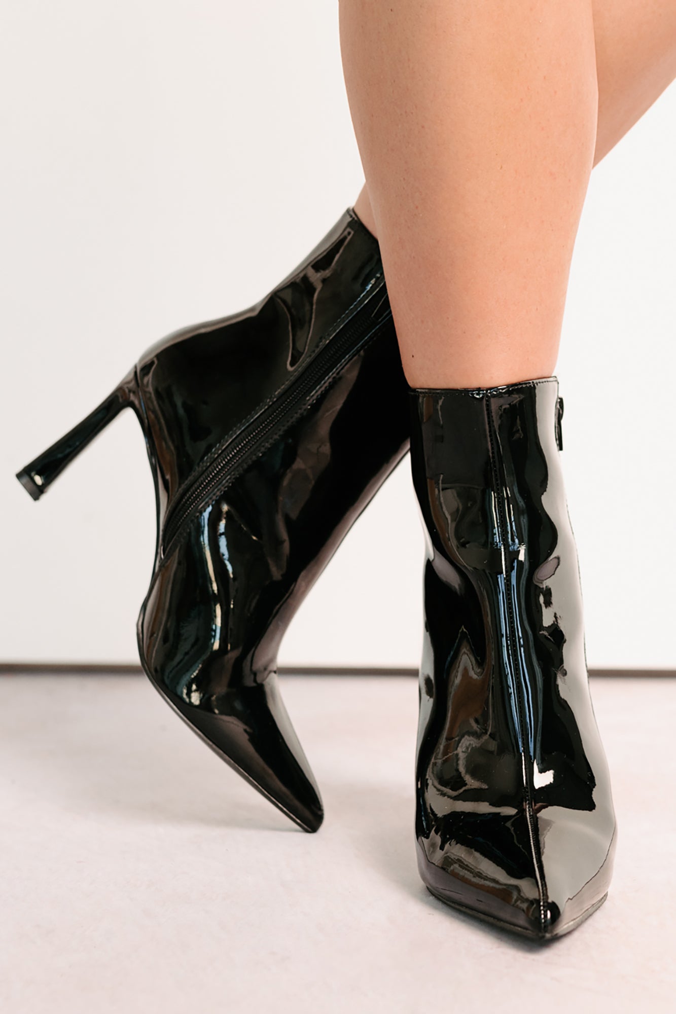 Queen Status Pointed Toe Heeled Booties (Black Patent)